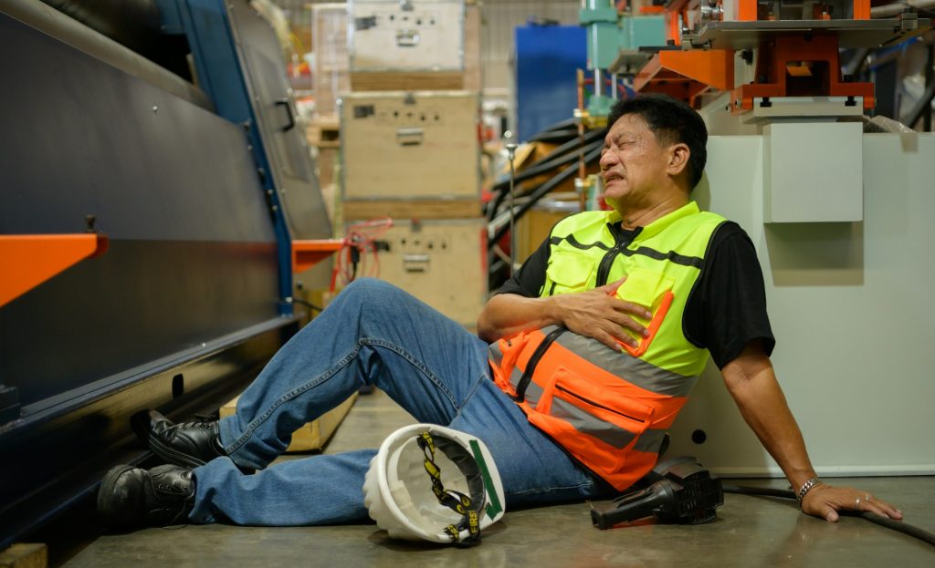 Factory worker Working hard until the symptoms of congenital disease exacerbate